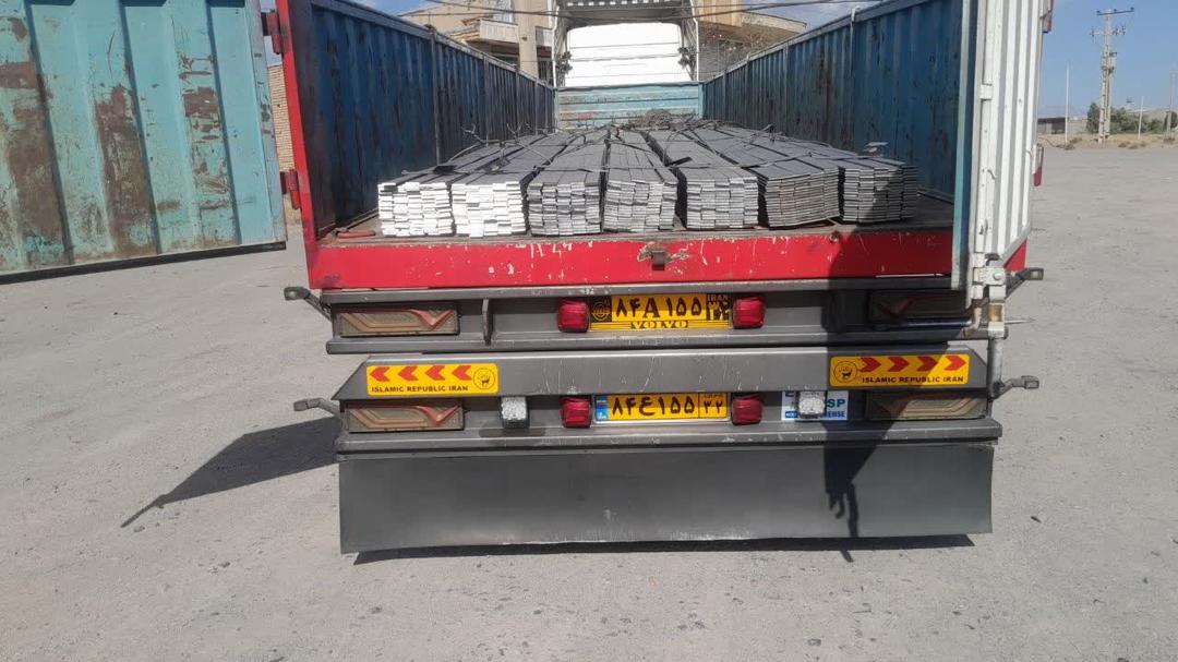 Rear view of a truck loaded with steel strips