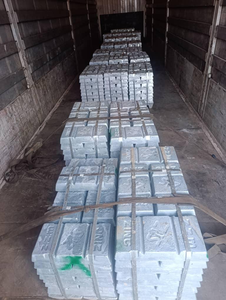 Another angle of zinc ingots in a container