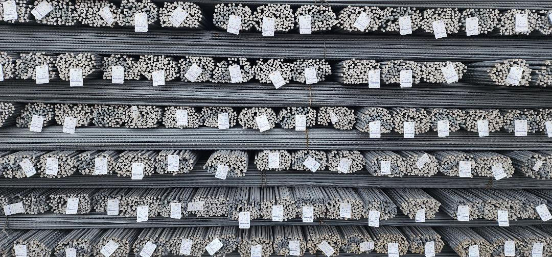 Large stack of steel rebar bundles