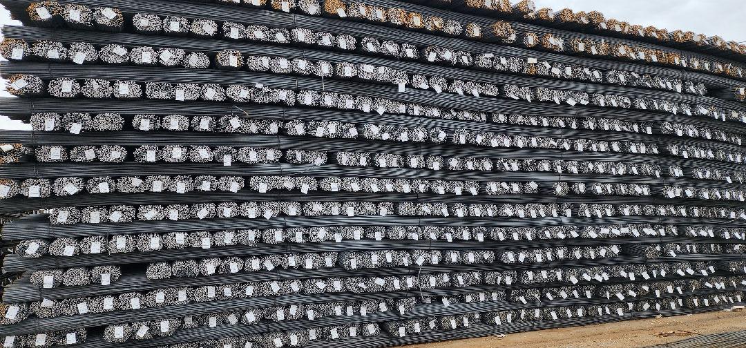 Another view of stacked rebar bundles